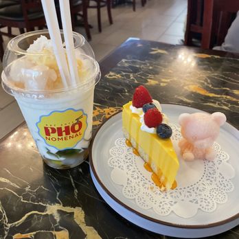 Pho-nomenal - On the left, Tropical Fruits Che' and on the right, Mango Passion Cake with frozen yogurt Bear (Our favorite!) - Vietnamese Near Me - Ashburn, Virginia Pho-nomenal - On the left, Tropical Fruits Che' and on the right, Mango Passion Cake with frozen yogurt Bear (Our favorite!) - Vietnamese Near Me - Ashburn, Virginia