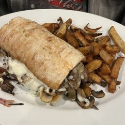 Cheese steak and fries Cheese steak and fries