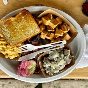 Cordwood Barbecue - a plate of food on a table - Food Trucks Near Me - Traverse City, Michigan Cordwood Barbecue - a plate of food on a table - Food Trucks Near Me - Traverse City, Michigan