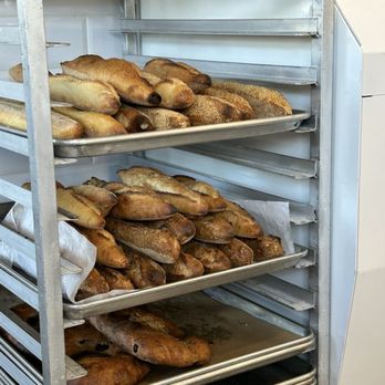 Bree’osh - Santa Barbara - Racks of freshly made bread - Bakeries Near Me - Santa Barbara, California