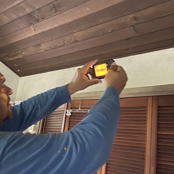Honey Bee Rescue - Peter is using his infrared camera to locate exactly where the bees are. - Pest Control Near Me