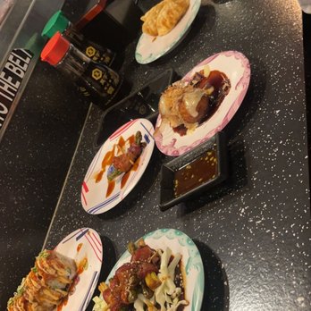 Forever Sushi - plates of food on a counter - Sushi Bars Near Me - Puyallup, Washington Forever Sushi - plates of food on a counter - Sushi Bars Near Me - Puyallup, Washington