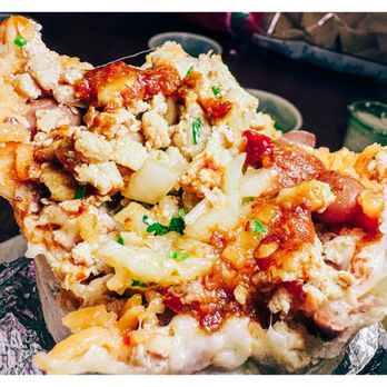 Tacos La Cuadra - Detail of the inside of my pollo burrito - onions, chicken, beans, cheese, salsa - Mexican Near Me - Seattle, Washington Tacos La Cuadra - Detail of the inside of my pollo burrito - onions, chicken, beans, cheese, salsa - Mexican Near Me - Seattle, Washington