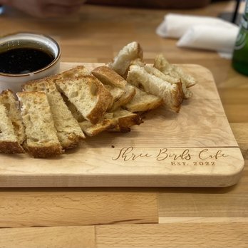 Three Birds Cafe - Olive oil dip with toasted bread - Cafes Near Me - Winter Garden, Florida Three Birds Cafe - Olive oil dip with toasted bread - Cafes Near Me - Winter Garden, Florida