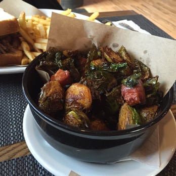 2 Jerks BBQ - Crispy Brussels sprouts ( brisket sandwich on Texas toast in the background) - Barbeque Near Me - Raynham, Massachusetts 2 Jerks BBQ - Crispy Brussels sprouts ( brisket sandwich on Texas toast in the background) - Barbeque Near Me - Raynham, Massachusetts