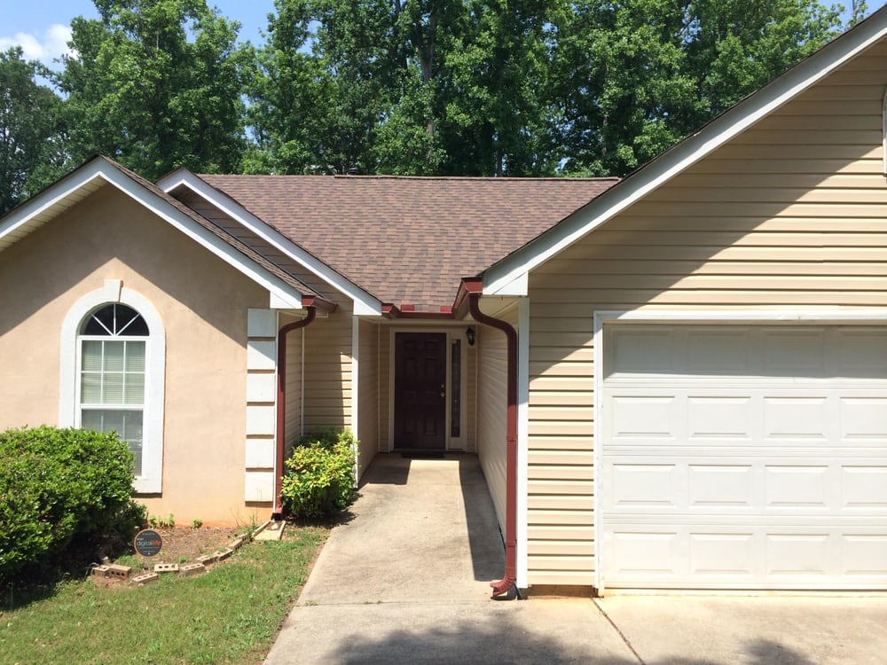 Slide of Palace Roofing Restoration & Gutters