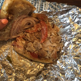 Pucillo's Pizza & Restaurant - a hand holding a sandwich - Pizza Near Me - Lebanon, Pennsylvania Pucillo's Pizza & Restaurant - a hand holding a sandwich - Pizza Near Me - Lebanon, Pennsylvania