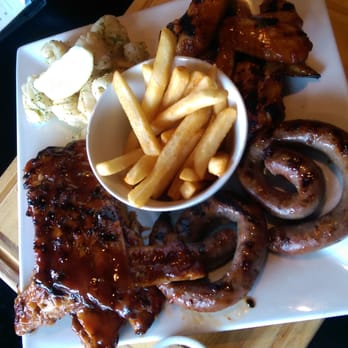 Flame Bar & Grill - Small taster platter to share. Ribs, sausages, calamari and chicjen wings. - Bars Near Me - Queenstown, OTA