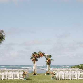 Loulu Palm - Lawn ceremony setup with chuppah and white chairs - Venues & Event Spaces Near Me - Haleiwa, Hawaii Loulu Palm - Lawn ceremony setup with chuppah and white chairs - Venues & Event Spaces Near Me - Haleiwa, Hawaii