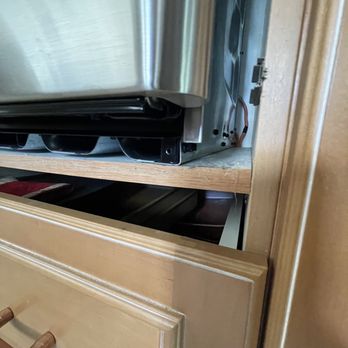 Elite 1 Services - Bryan's decided to simply set the oven in the cabinet which was not nearly strong enough to support it. We are lucky it didn't fall out! - Heating & Air Conditioning/HVAC Near Me