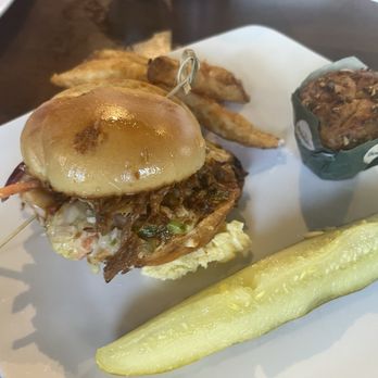Black Label Tavern - Pulled pork slider, I swiped the pickle from the Bloody Mary bar (shhh! Don't tell anyone! Boursin garlic and herb muffin, so good! - Salad Near Me - Shelby Township, Michigan