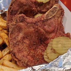 Porkchops El Paso - Fried pork chop plate with Cajun fries.