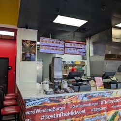 Taystee's Burgers - Order here. Laminated menus are easier to read than the back wall.