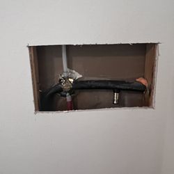 Ace Handyman Services Northwest San Antonio - Needed to correct plumbing flaw from builder. House is just past it's 1 year warranty. Cut out drywall.