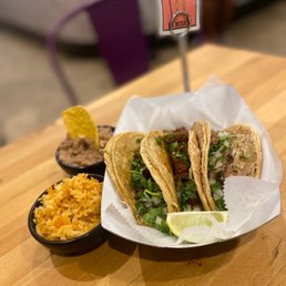 Three Tacos with Arroz, Frijoles and Jarrito