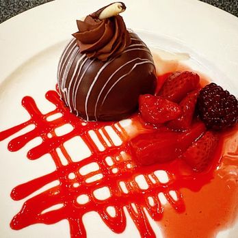 Gallery Bar & Grill - Chocolate mousse cake dome w fresh berries and coulis - Cocktail Bars Near Me - Los Angeles, California