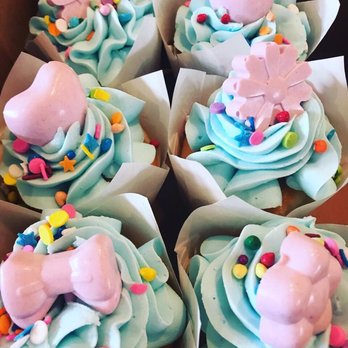 Simply Fabulous Bakery - Vanilla with buttercream icing with cupcake candy on top - Bakeries Near Me