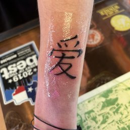 Love symbol tattoo