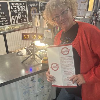 Mama D's - Mom winning a free entree - Pizza Near Me - Torrance, California