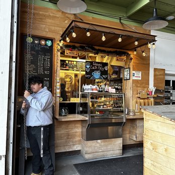 Toby's Coffee Bar - a man standing in front of the counter - Coffee & Tea Near Me - Point Reyes Station, California Toby's Coffee Bar - a man standing in front of the counter - Coffee & Tea Near Me - Point Reyes Station, California