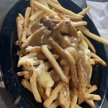 JP Waterfront - Poutine - Bars Near Me - Gibraltar, Michigan