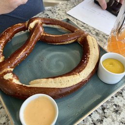 Pretzel w/ cheese sauce and mustard Pretzel w/ cheese sauce and mustard