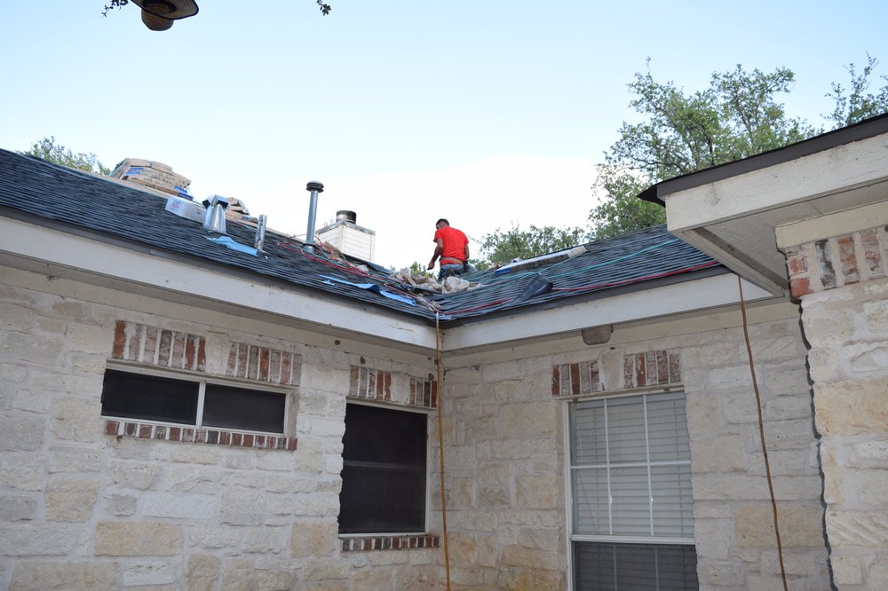 Slide of Top Notch Roofing