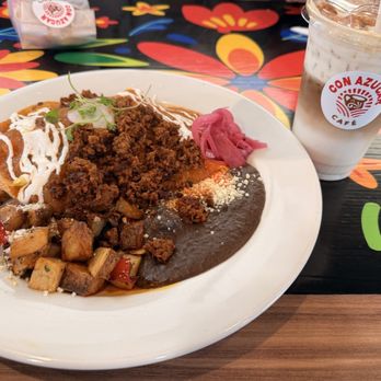 Con Azucar Cafe - Huevos rancheros con chorizo. Churro iced coffee on the side - Coffee & Tea Near Me - Manteca, California Con Azucar Cafe - Huevos rancheros con chorizo. Churro iced coffee on the side - Coffee & Tea Near Me - Manteca, California