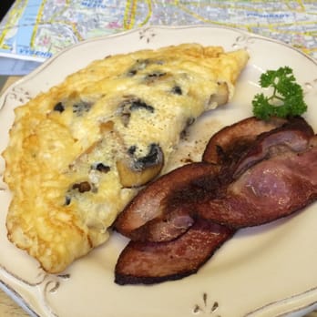 Room tapas bar restaurant - Mushroom & Cheese omelet with bacon in Prague - Tapas/Small Plates Near Me - Prague, Puerto Rico Room tapas bar restaurant - Mushroom & Cheese omelet with bacon in Prague - Tapas/Small Plates Near Me - Prague, Puerto Rico