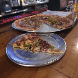 Redbone Magic Brewing - The high card pizza is  full of flavors and a little heat. Don't be scared