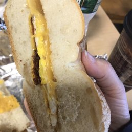 One egg, one piece of cheese and one piece of bacon broken in pieces RIPOFF One egg, one piece of cheese and one piece of bacon broken in pieces RIPOFF