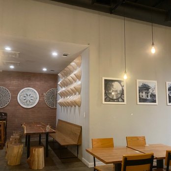 Ngon Vietnamese Kitchen - Back nook, cool wood seats and reclaimed wood table for larger groups - Vietnamese Near Me - Dallas, Texas