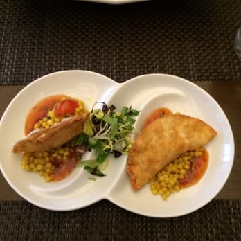 AnQi Bistro - Curry potstickers on couscous - Asian Fusion Near Me - Costa Mesa, California