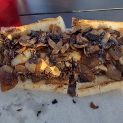FlyBy Philly’s - 12" Beer Cheese Wit, wit extra onion, mushrooms, and mustard!