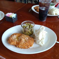 Carmelas Pizza & Italian Restaurant - Parmesan chicken breast, with homemade mashed potatoes and string beans. Delicious!