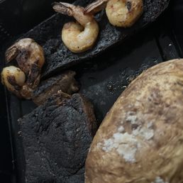 I ordered a medium steak and shrimp combo burnt to the point that they should have never served it. I ordered a medium steak and shrimp combo burnt to the point that they should have never served it.