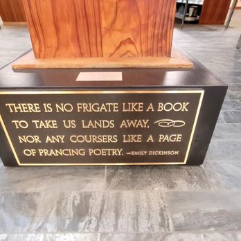 Alameda Free Library - Quote beneath the statue/art piece encircled by the stairs. - Libraries Near Me - Alameda, California