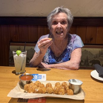 Twin Peaks - My Mommy enjoying the cheese bites! - Sports Bars Near Me - Altamonte Springs, Florida