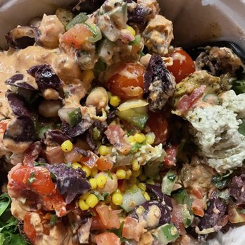 Mezeh Mediterranean Grill - Mixed bowl with hummus, olives, corn, falafel, chicken, etc - Mediterranean Near Me - Charlotte, North Carolina Mezeh Mediterranean Grill - Mixed bowl with hummus, olives, corn, falafel, chicken, etc - Mediterranean Near Me - Charlotte, North Carolina