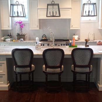 Triangle Cabinets & Renovations - Very practical kitchen with integrated fridge and freezer, lots of sun light and marble tops. (North Hills) Raleigh, NC - General Contractors Near Me - Raleigh, North Carolina