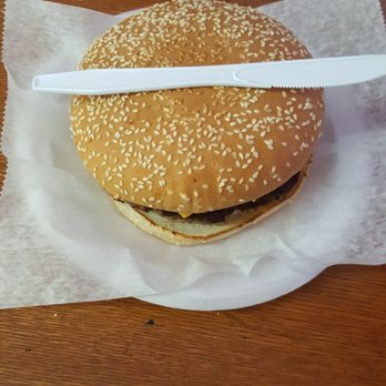 Scott's Place - Big C bacon cheeseburger. Plastic knife is for scale. - Delis Near Me - Knoxville, Tennessee Scott's Place - Big C bacon cheeseburger. Plastic knife is for scale. - Delis Near Me - Knoxville, Tennessee