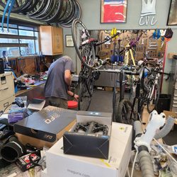 Castro Valley Cyclery - John hard at work with my bike conversion.