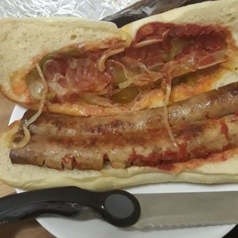 Martell's Tiki Bar - The $9.99 Sausage, pepper & onion with "extra sauce" to go order - Tiki Bars Near Me - Point Pleasant, New Jersey