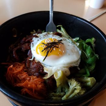 Gogi BiBimBap - Bibimbap bowl with purple rice, veggies, spicy pork, and a "half" fried egg (i.e., runny yok). So good! - Korean Near Me - Henrico, Virginia Gogi BiBimBap - Bibimbap bowl with purple rice, veggies, spicy pork, and a "half" fried egg (i.e., runny yok). So good! - Korean Near Me - Henrico, Virginia