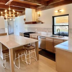 Cali Stone Artisans - Transform your kitchen with Rta cabinets, Calacatta Brasile quartzite, and a modern tile backsplash! Call (866) 205-6868!