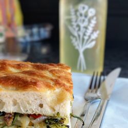 Fusion Cafe + Wine - Toasted Mediterranean sandwich on house-made foccacia bread
