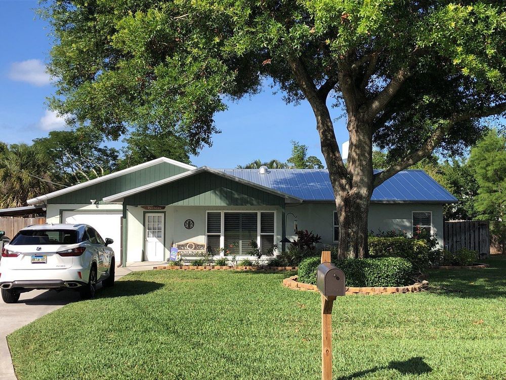 Slide of Orchid Island Roofing