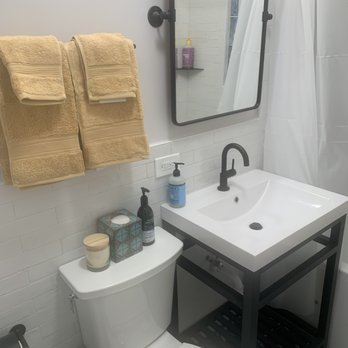 Stratagem Construction - a bathroom with a sink and toilet - General Contractors Near Me - Chicago, Illinois