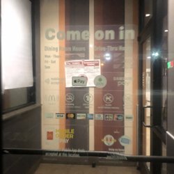 McDonald's - Employees are lazy & no opening and closing time listed.When I walked up tonight at 11pm the girl was out front in front of the door smoking