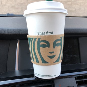 Starbucks - a cup of coffee on the dashboard of a car - Coffee & Tea Near Me - Fort Irwin, California Starbucks - a cup of coffee on the dashboard of a car - Coffee & Tea Near Me - Fort Irwin, California